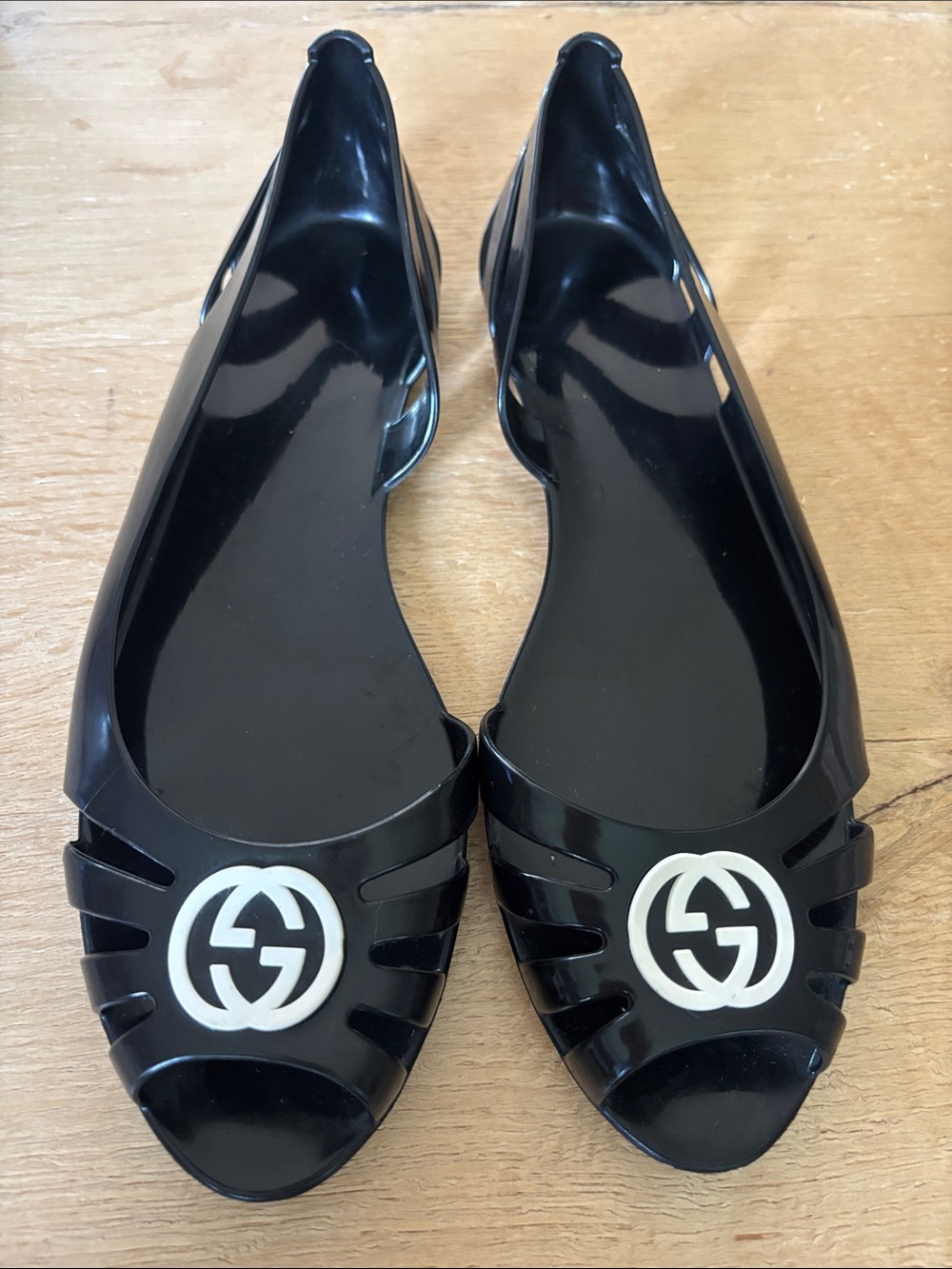 Gucci Black Jelly Flats with White Logo Cutouts